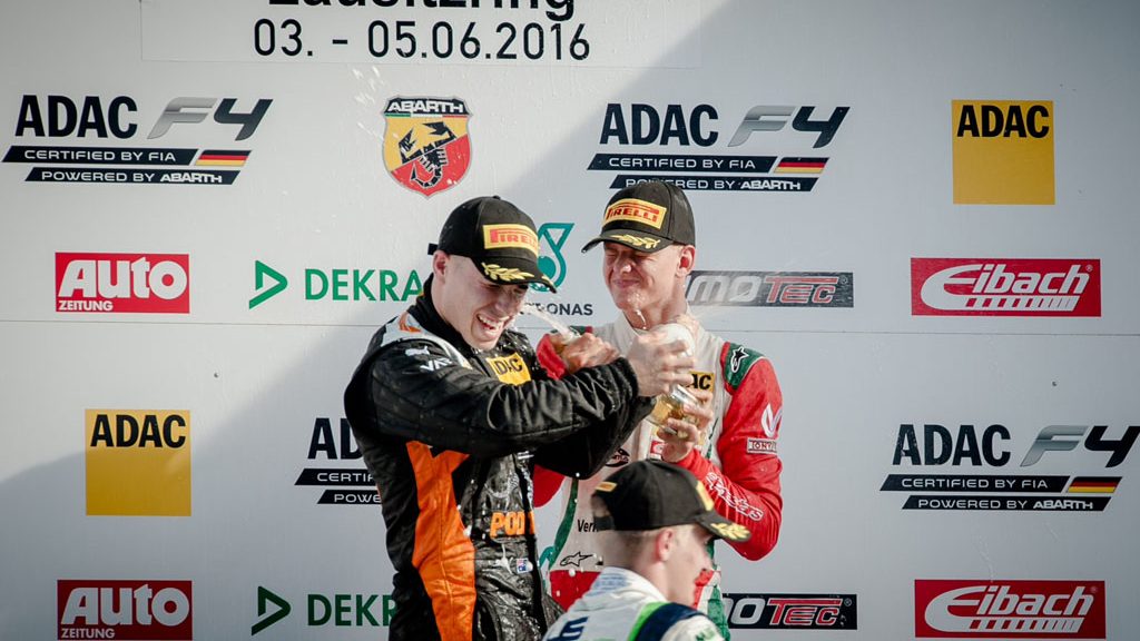 Joey Mawson enjoying the spoils of finishing on the podium in Race Two with Mick Schumacher.
